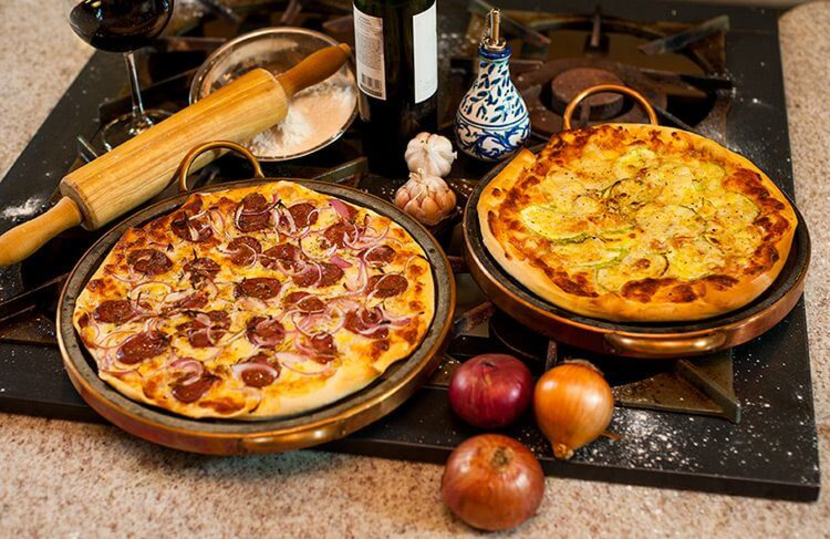 Forno com pizzas assadas - como-montar-um-restaurante-de-comida-italiana-saipos-sistema-para-restaurante